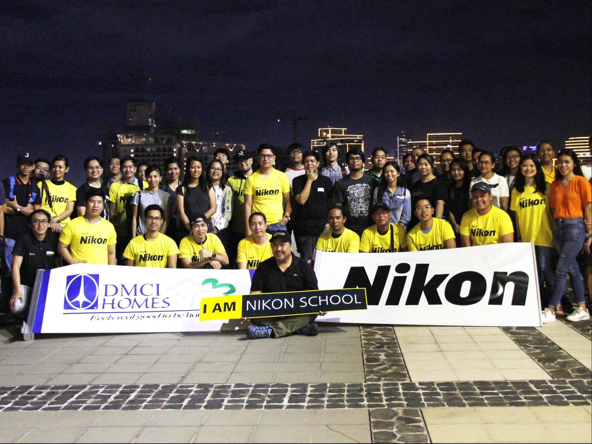 Participants of “Urbanscapes” pose for a souvenir shot with Nikon Philippines brand influencer Cris Magsino at the roof-deck of the Iris Tower in DMCI Homes’ Tivoli Garden Residences. 